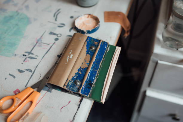 istock Artist and Printmaker working in her studio 1351539426