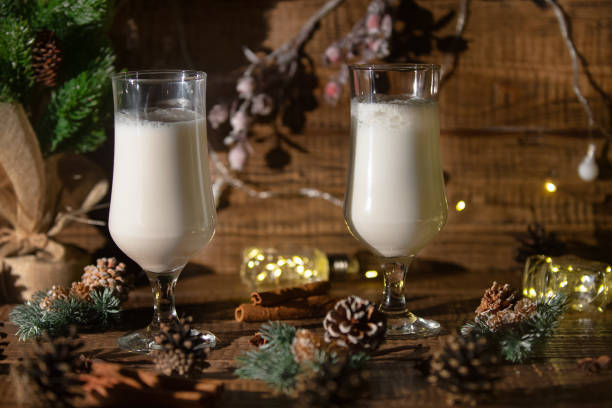 Eggnog Christmas drink on wooden background stock photo