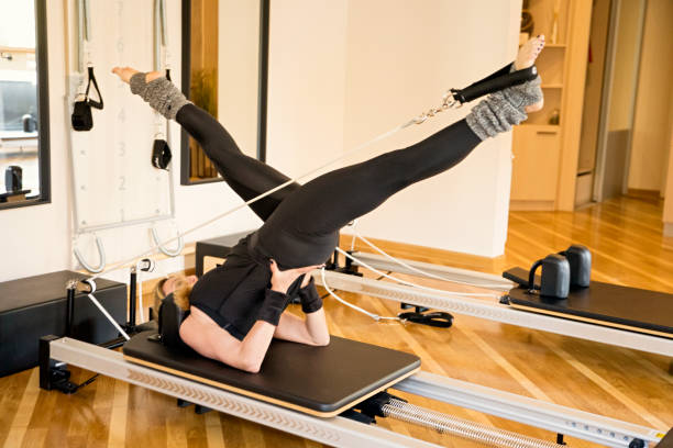 istock Woman performing the pilates exercise 1351541878
