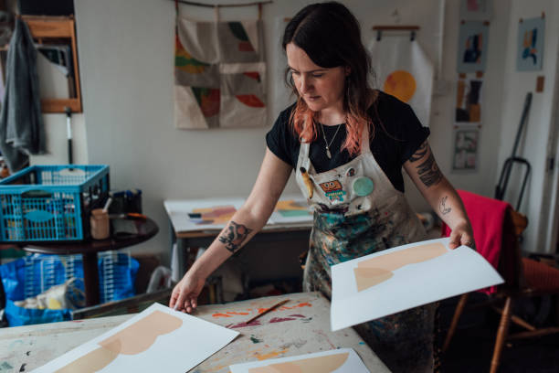 istock Artist and Printmaker working in her studio 1351541922