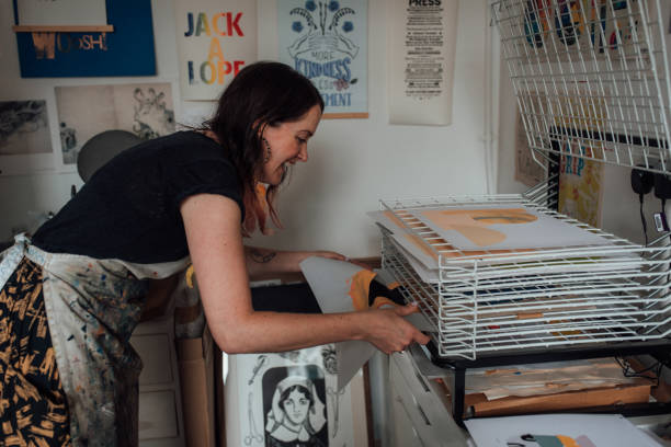 istock Artist and Printmaker working in her studio 1351544828