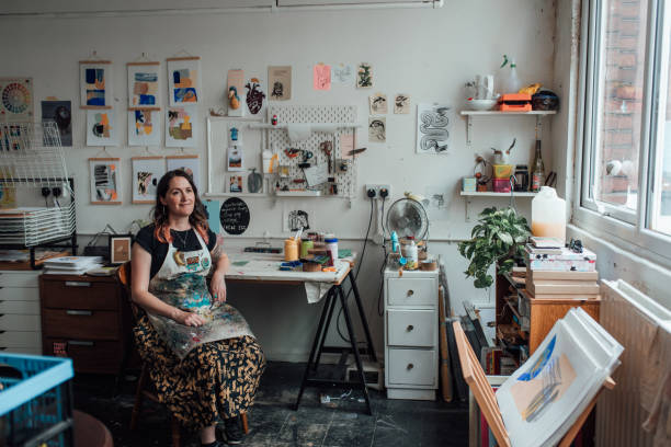 istock Artist and Printmaker working in her studio 1351544994