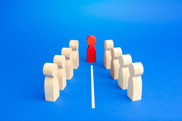 istock Mediator separates two conflicting groups with a white line. Resolution of the conflict through negotiations. Mediation and Arbitration. Deescalation of dispute. Concluding a truce, end confrontation 1351545153
