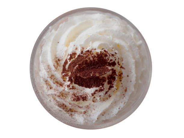 Whipped cream with chocolate powder isolated on white background, circle shape