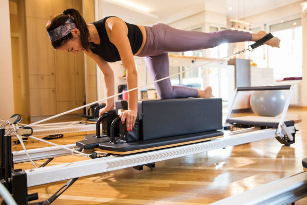 istock Woman performing the pilates exercise 1351550379