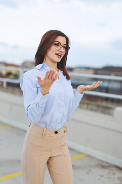 istock Young nerd businesswoman explain at outdoors in city 1351558607