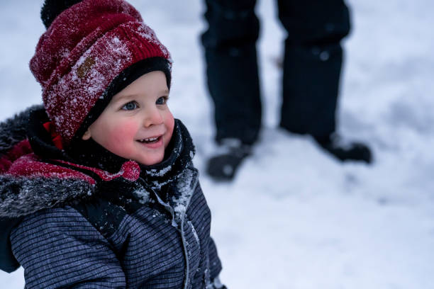 istock Young boy having fun in the snow. 1351567985
