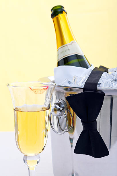 istock Champagne, black tie and lipstick 135157083
