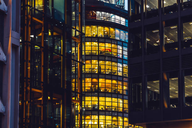 istock Illuminated office buildings in London 1351572585