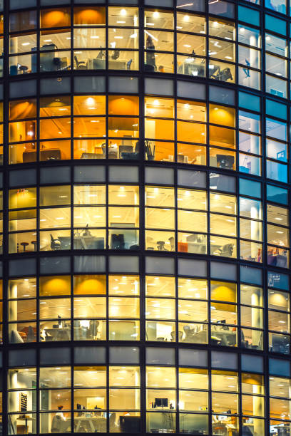 istock Illuminated office buildings in London 1351572599