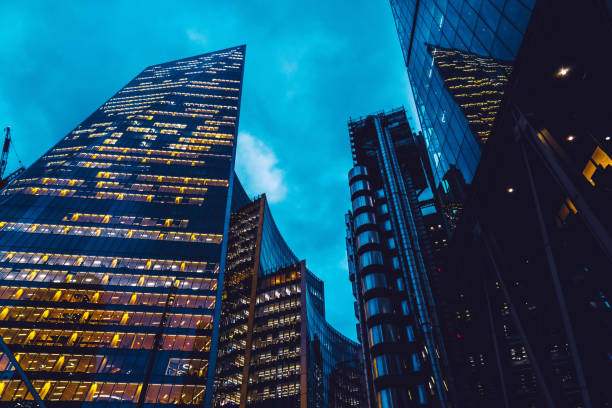 istock Illuminated office buildings in London 1351572610