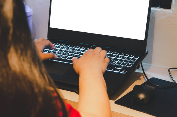 istock Business woman hand typing computer blank screen mock  up at desk 1351574105