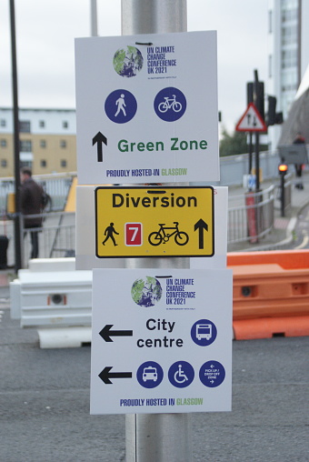 Glasgow, Scotland, United Kingdom, November 6 2021: Direction signage has been placed around the city to help delegates find their way to the conference.