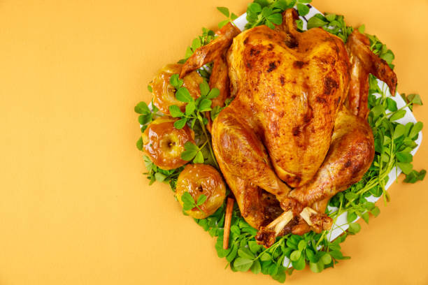 istock Grilled turkey garnished with caramel apples and clover leaves. 1351585414