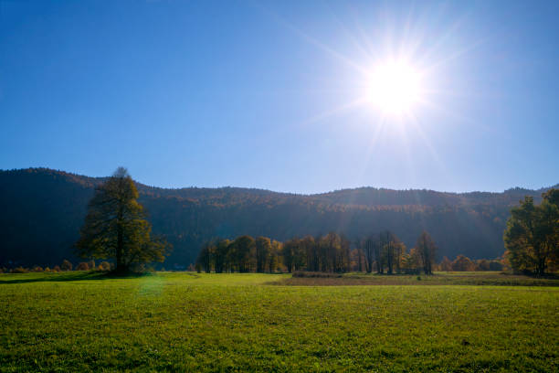 Autumn evening sun on Intermittent lake Planinsko polje, which is dry, what is one of the characteristics of the karst field - Lake. All those meadows are under the water in rainy season, Slovenia.