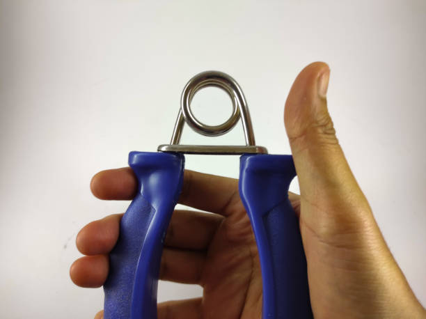 istock Holding grip trainer - stock photo 1351597802