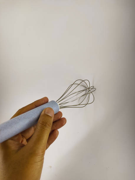 istock Holding whisk balloon - stock photo 1351598363