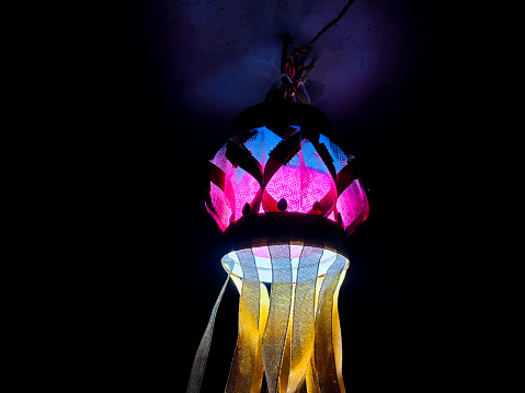 Indian Diwali festival colorful glowing lantern on the home at night as a background