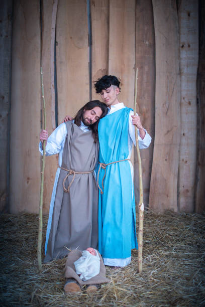 istock Lgtb version of a nativity scene with two men 1351602090