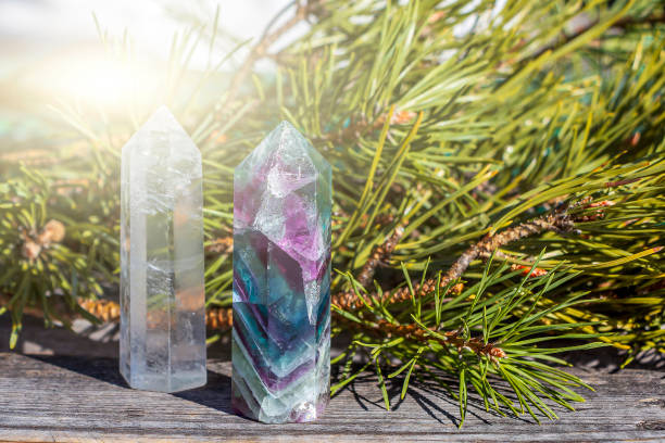 istock Magic still life with fluorite crystal among spruce branches. Rocks for mystic ritual, witchcraft Wiccan or spiritual healing in forest Fortune telling, rituals for Christmas and 1351603574