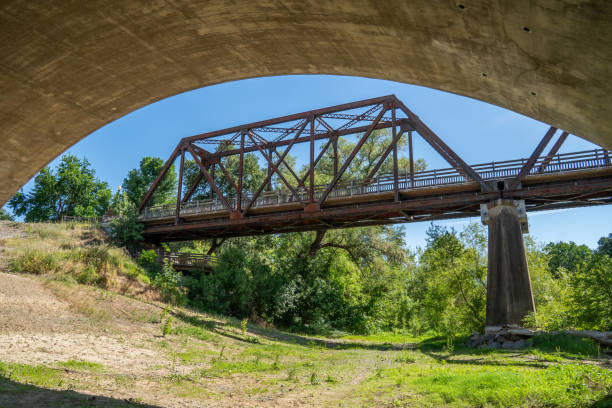 istock Old iron rusty bridge over a Putah Creek in Winters CA. 1351606509