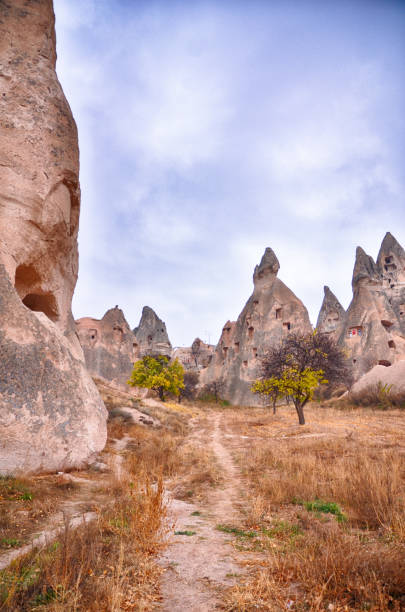 istock Rock formations of Uchisar Castle in Cappodocia, Turkey 1351606795