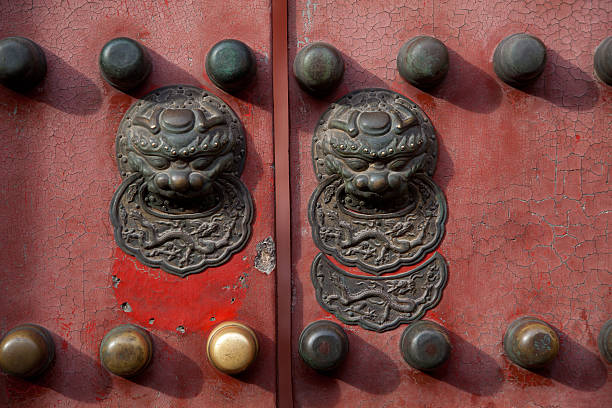 istock Chinese red door with two lions/dragons head 135160841