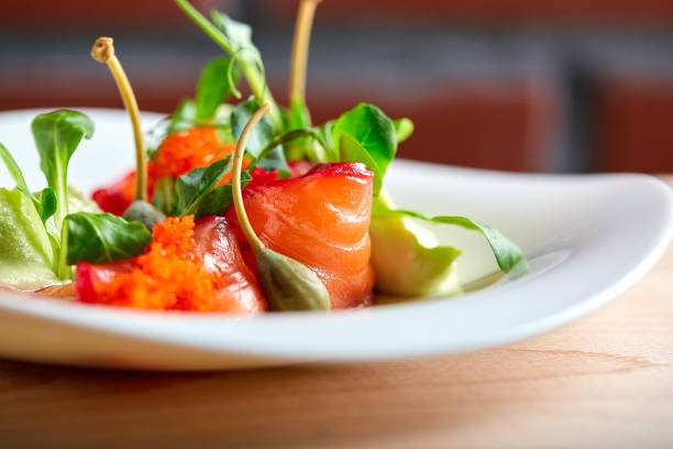 istock Smoked Salmon Salad on wooden background 1351609846