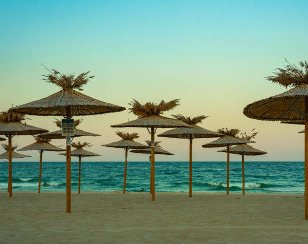 istock Evening summer beach with umbrellas. Varna, Bulgaria 1351624343