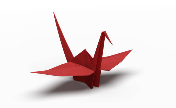 istock Isolated red crane bird origami. 1351630781