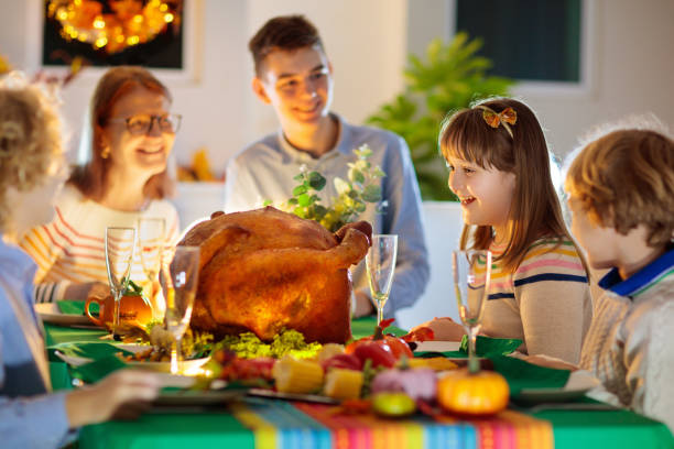 istock Thanksgiving family dinner. Roasted turkey meal. 1351632934