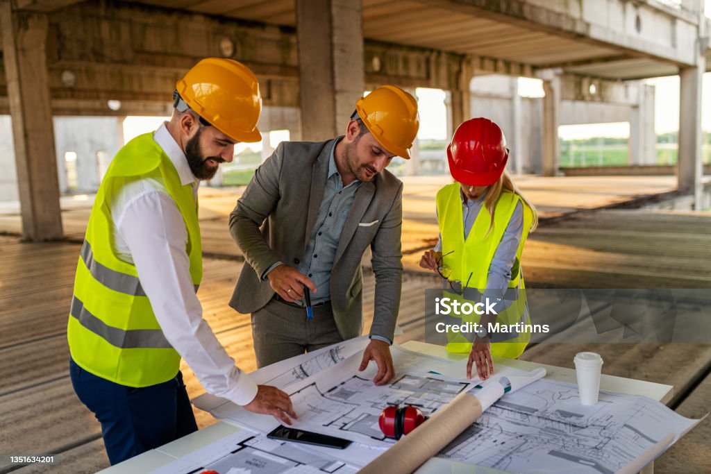 Construction Engineering Manager Construction Manager Explaining To The Civil Engineers The Plans For ...
