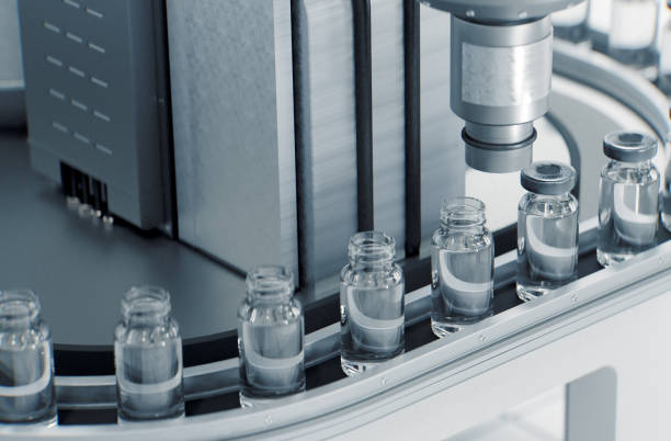 istock Bottling vaccine vials in a pharmaceutical factory 1351636238