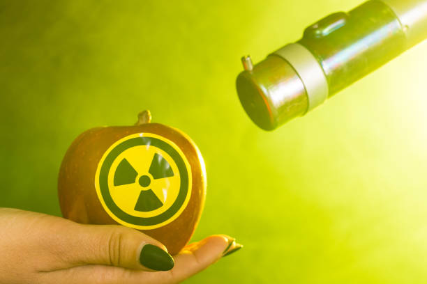 istock Radiation and danger concept - The worker doing measure radioactivity 1351638093