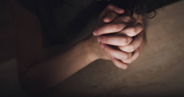 istock Woman hands praying to god. 1351644877