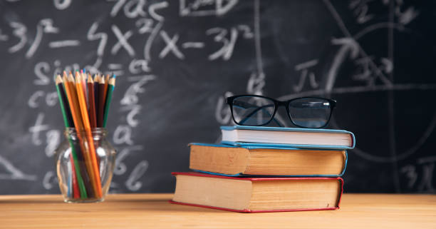 istock glasses on book with pencils on jar 1351644883