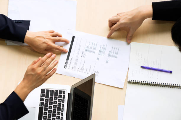 istock White collar workers engagement and meeting. 1351650110