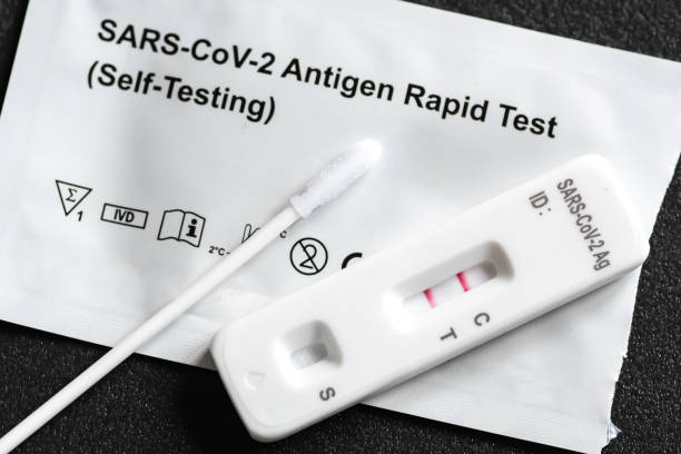 istock Positive Covid-19 antigen test kit 1351650906