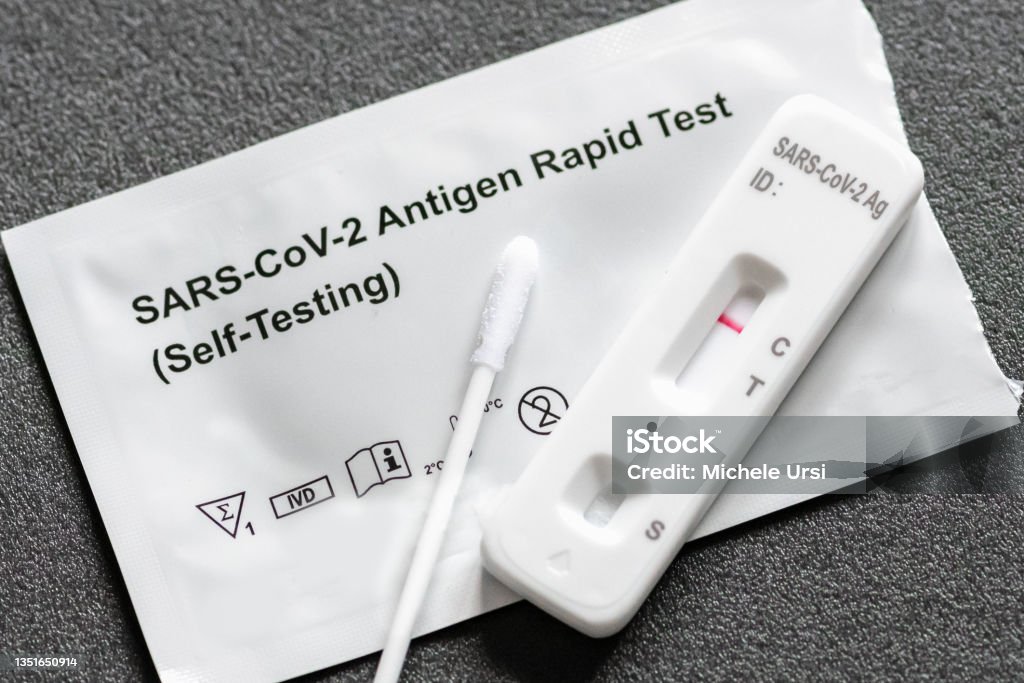 Negative Covid-19 antigen test kit Negative Covid-19 antigen test kit, one step coronavirus antigen rapid test, saliva swab, 1 test box with imagine of lungs, close up Coronavirus Stock Photo