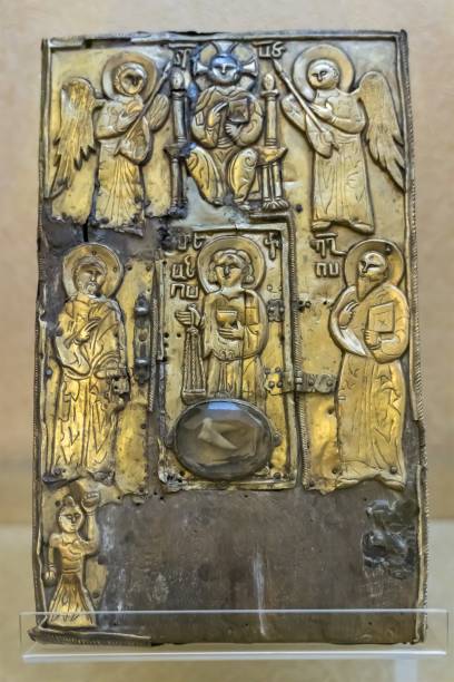 istock Armenia, Echmiadzin, September 2021. A gilded icon with a saint`s tooth under a transparent window. 1351660529