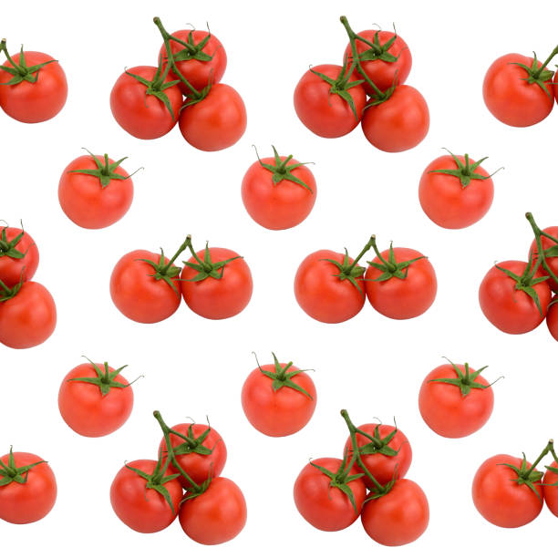 istock Pattern composed of red tomatoes. Some tomatoes are linked to each other by stalks 1351660718
