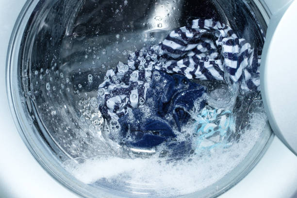 istock Linen washing in the washing machine. 1351667313