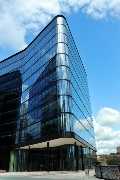 istock Glass, steel and clouds 1351670001
