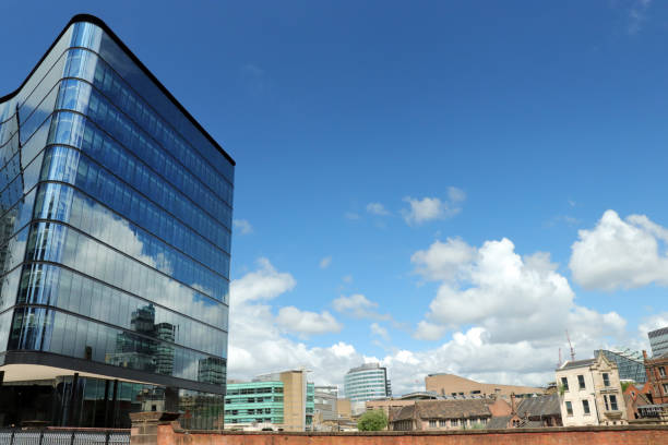istock Glass, steel and clouds 1351670009