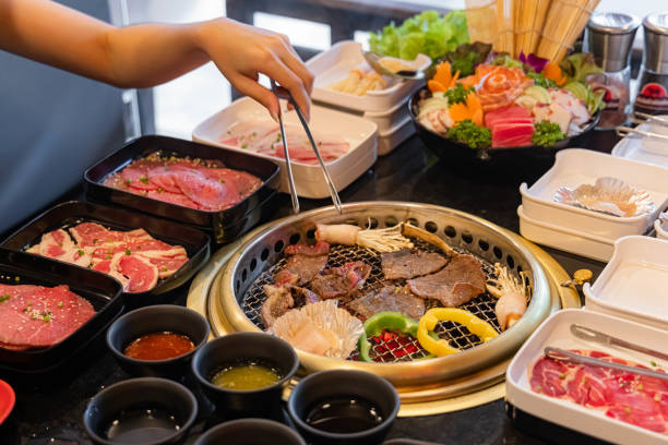Grilled buffet restaurant Grilled beef buffet food in the restaurant hot mix plant stock pictures, royalty-free photos & images