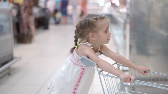 454 Kid Pushing Shopping Cart Stock Videos and Royalty-Free Footage - iStock