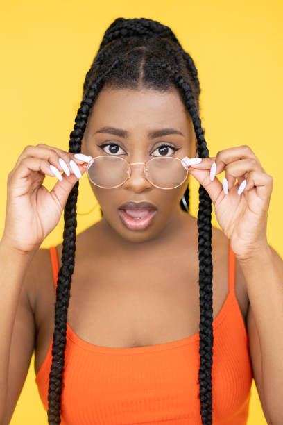 istock shocked woman amazed expression wow african face 1351675875
