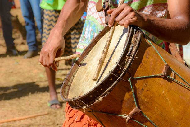 istock Ethnic and rustic handmade drums in a religious festival 1351677123