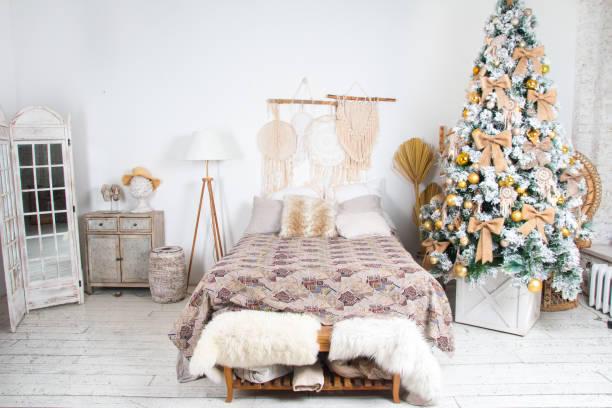 istock Christmas tree near the bed festive design 1351678690