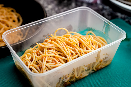 A food plastic box of pasta spaghetti take away